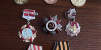 В Стародубском районном суде прошла выставка «Память о войне. Награды победителей». - Стародубский районный суд